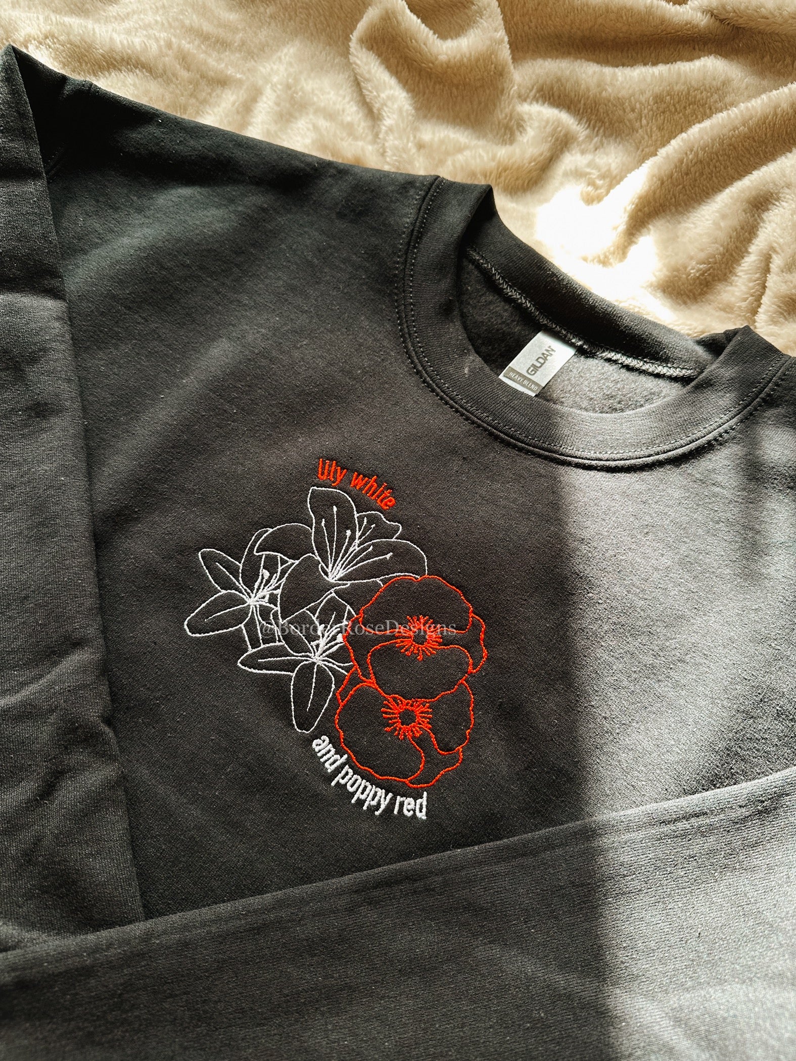 Lily White and Poppy Red Flowers Hadestown Unisex Embroidered Sweatshirt