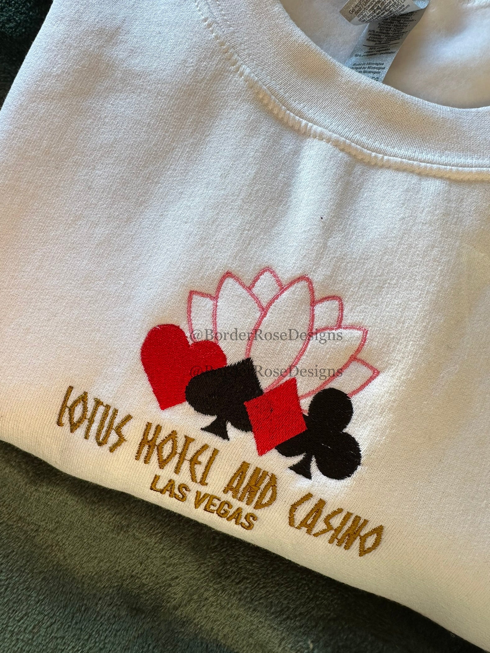 Lotus Hotel and Casino Unisex Embroidered Sweatshirt