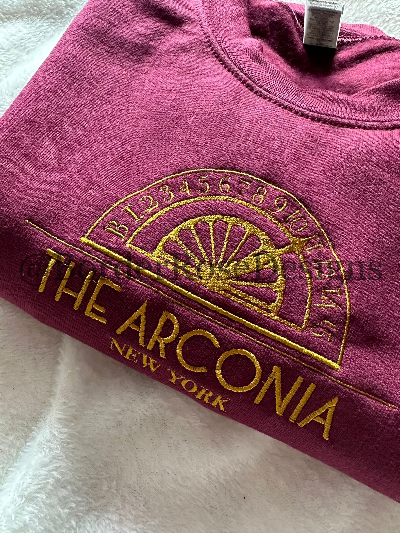 The Arconia OMITB Unisex Embroidered Sweatshirt
