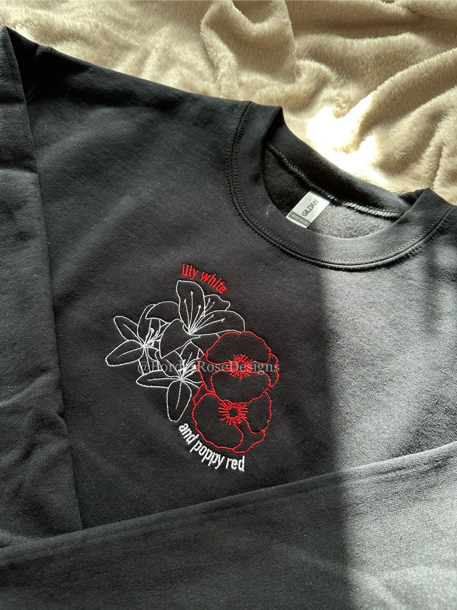 Lily White and Poppy Red Flowers Hadestown Unisex Embroidered Sweatshirt