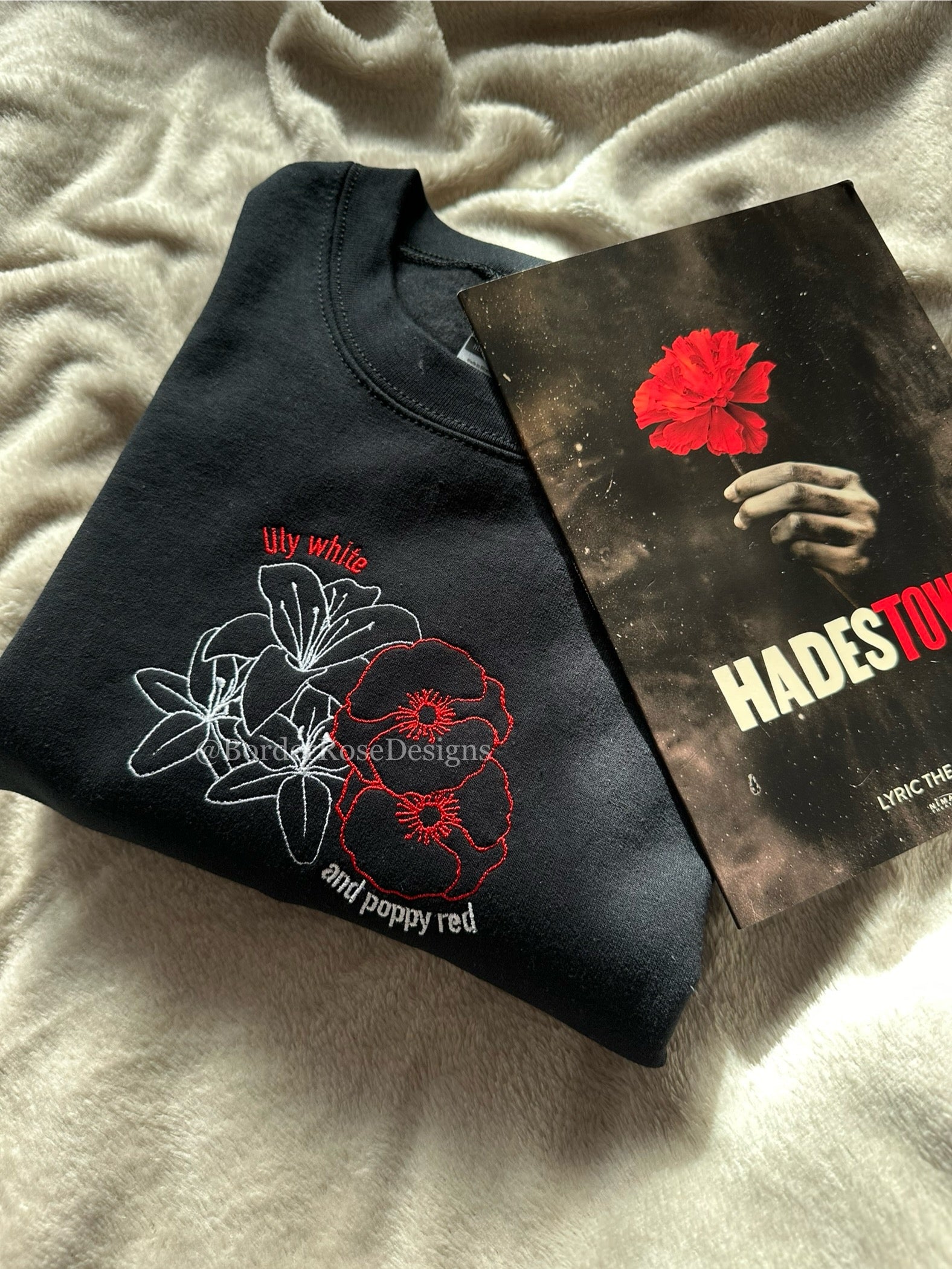 Lily White and Poppy Red Flowers Hadestown Unisex Embroidered Sweatshirt