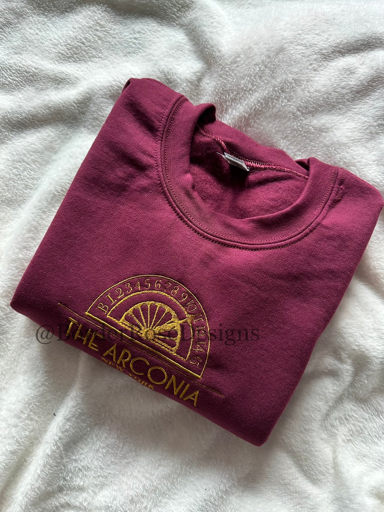The Arconia OMITB Unisex Embroidered Sweatshirt
