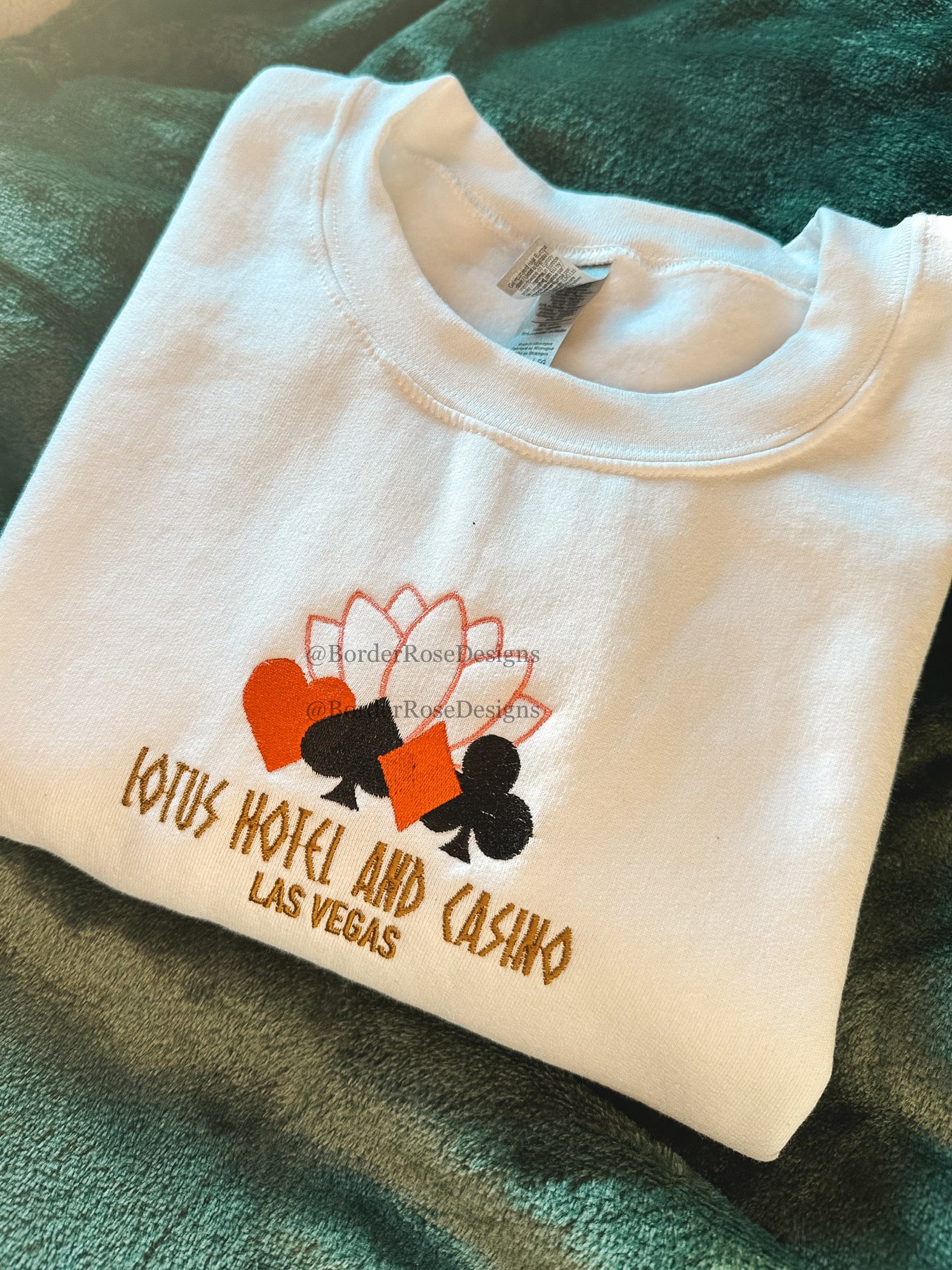 Lotus Hotel and Casino Unisex Embroidered Sweatshirt